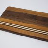 https://www.rockfordwoodcrafts.com/wp-content/uploads/Cherry-Walnut-and-Maple-with-Offset-Stripes-Cutting-Board-Top-Angled-100x100.jpg