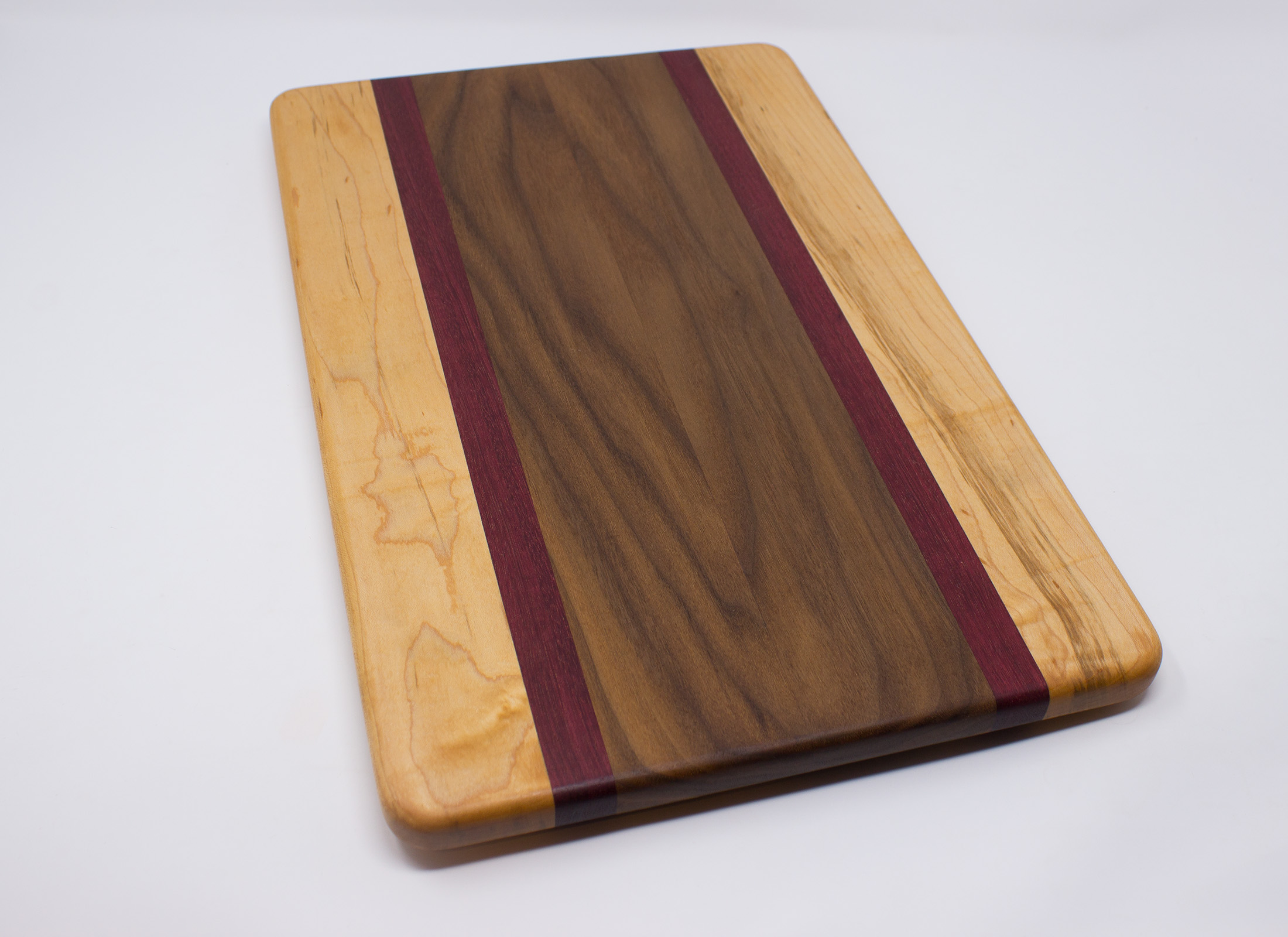Walnut with Purple Stripes and Maple Edges Cutting Board